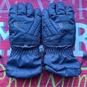 The NorthFace Youth Boy’s Medium Black gloves.  Gore-Tex